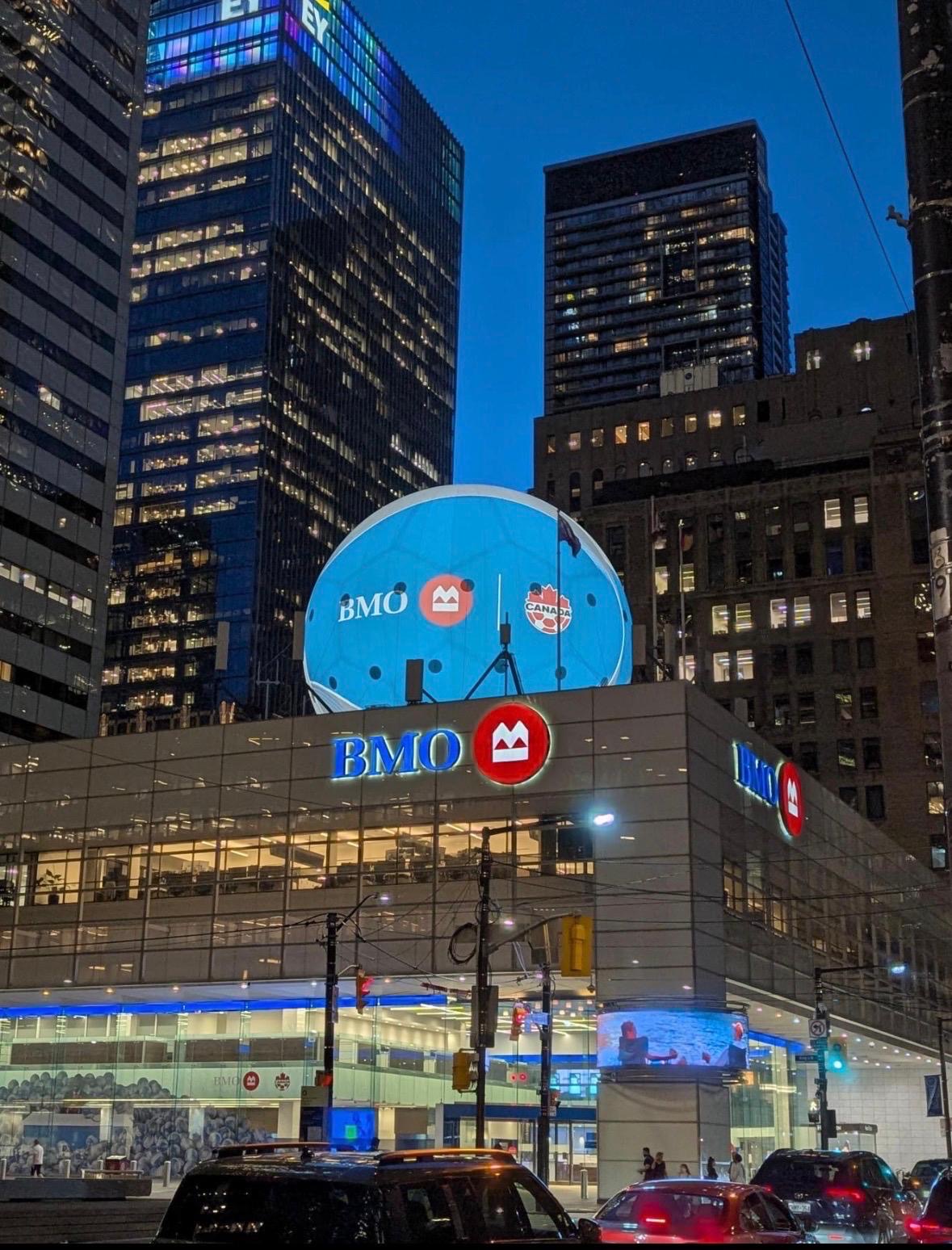 Illuminated BMO soccer ball on the First Canadian Place branch rooftop in Toronto